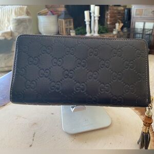 Gucci Black Embossed GG Zip-Around Wallet